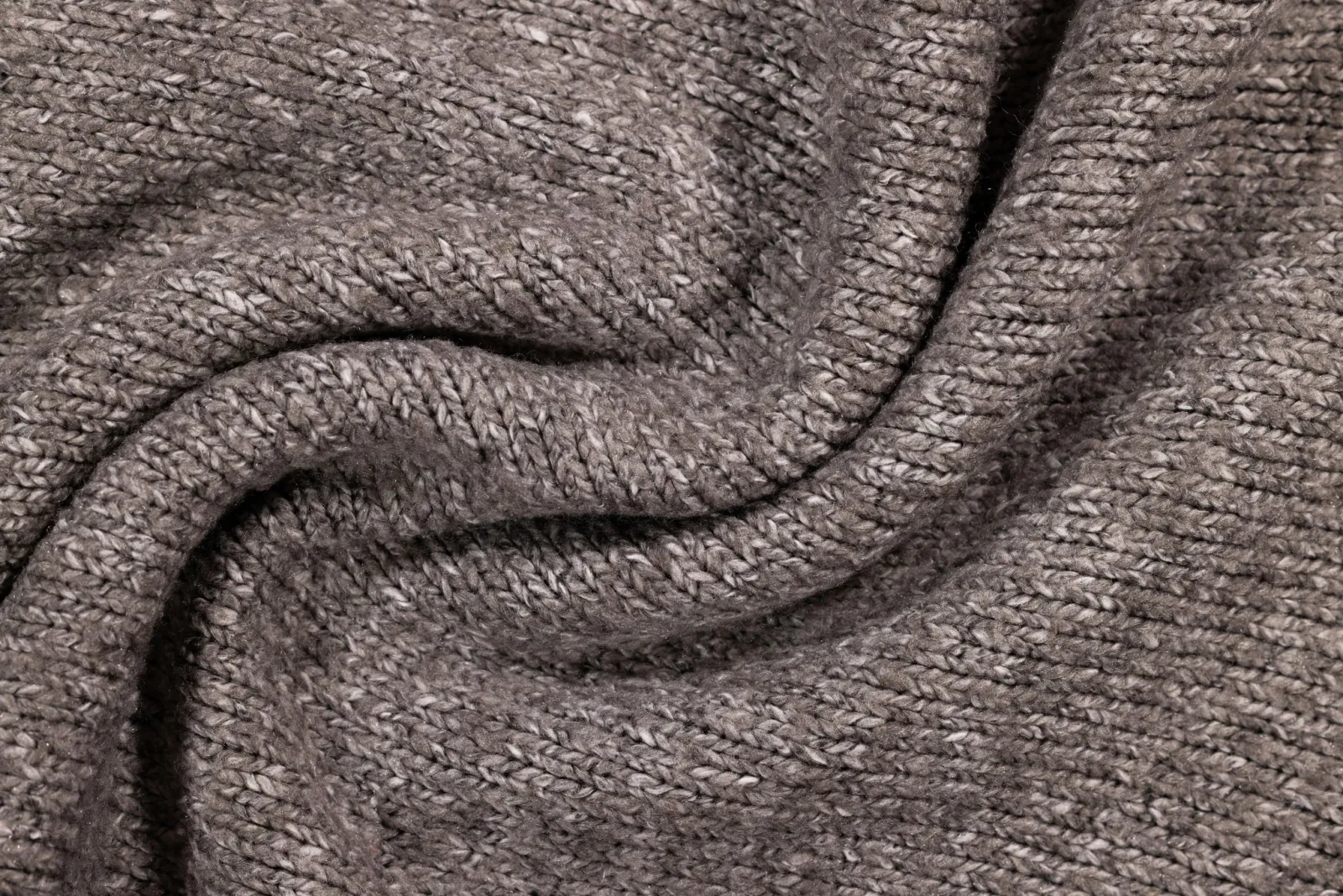 Close-up of grey knitted fabric